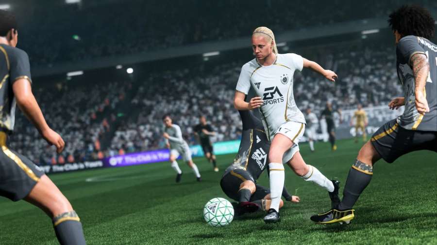 Defender executing a slide tackle to win the ball in FC 26 gameplay